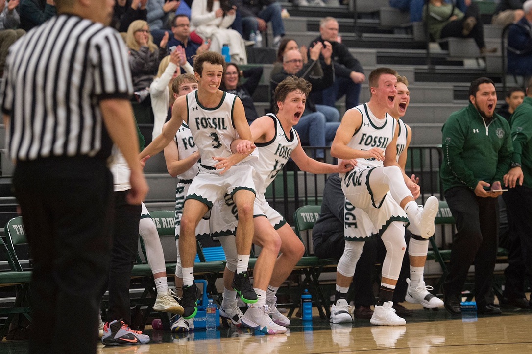 SaberCat bench celebrating a big play